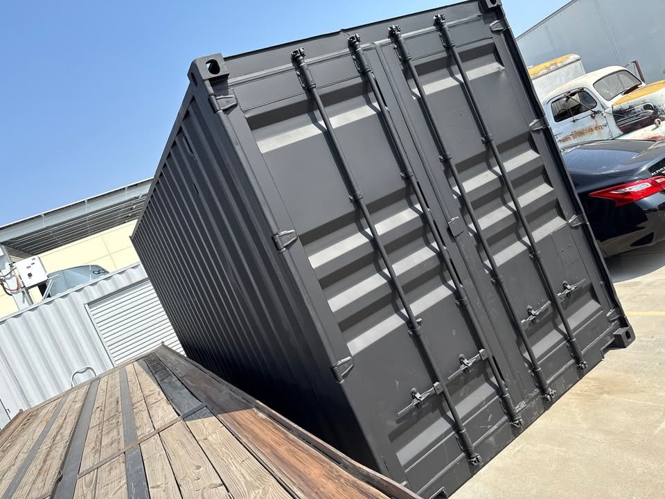 20ft Used Shipping Container – Matte Black w/ 12’ Side Roll-Up Door